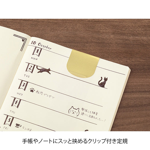 Midori Clip Ruler Cat – Clipped onto a notebook page
